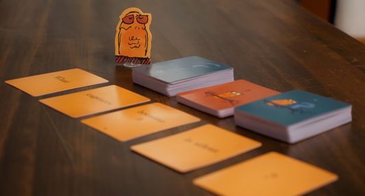 Smug Owls - A Party Game of Riddles - Runaway Parade Games