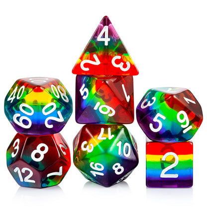 Set of rainbow-colored polyhedral dice on a white background