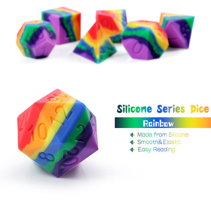 Colorful silicone dice with rainbow pattern on a white surface